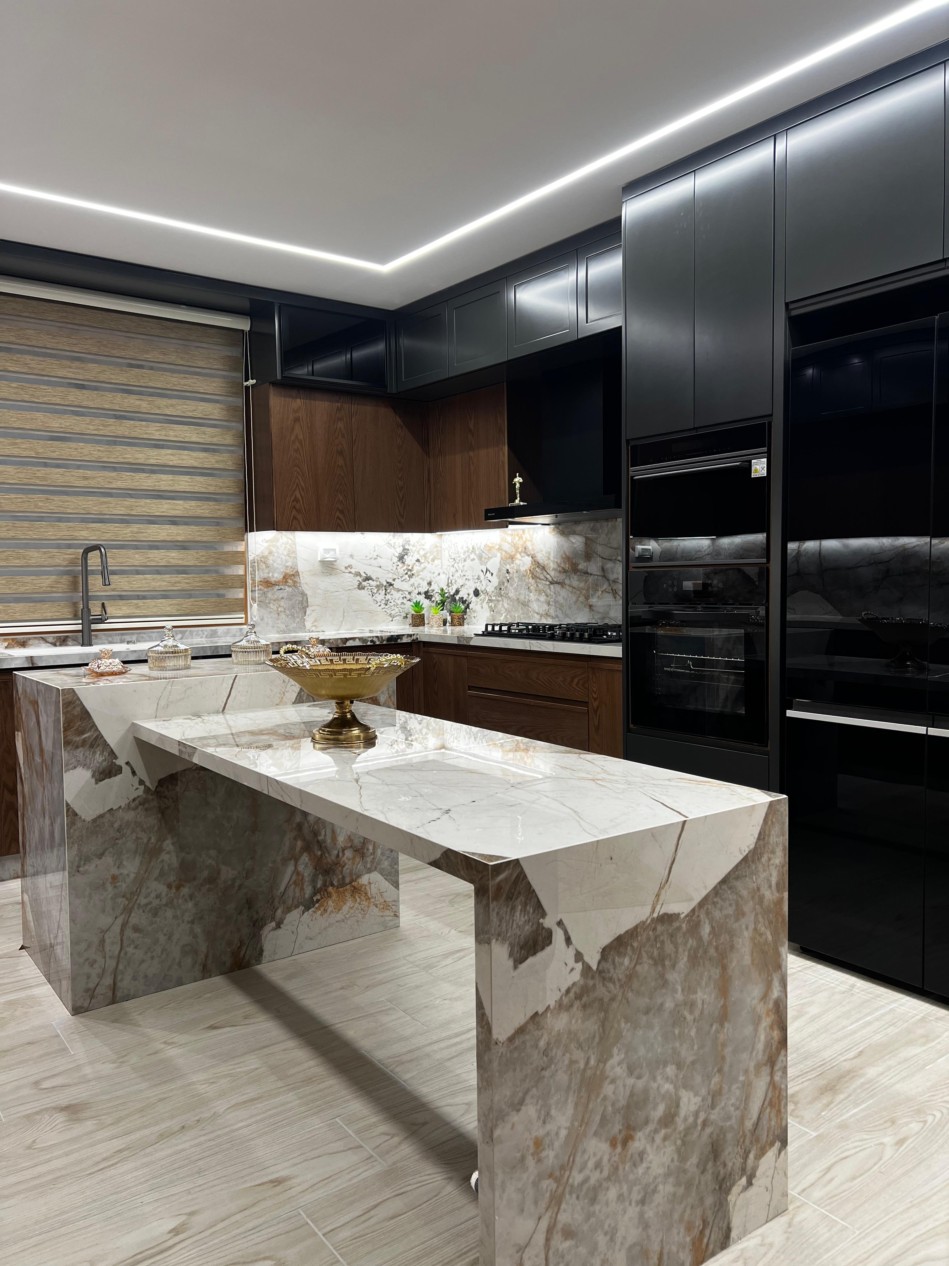 Marble Waterfall Island Kitchen